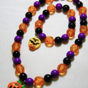 Halloween necklace set with smiling pumpkin pendants